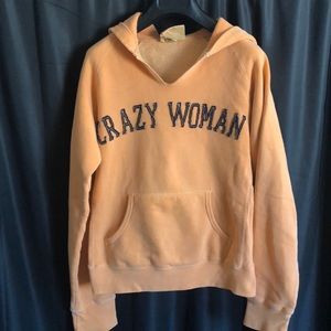 Genuine Merchandise Peach Hoodie with Navy Text
